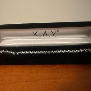 Kay Jeweler’s Blue Topaz Tennis Bracelet